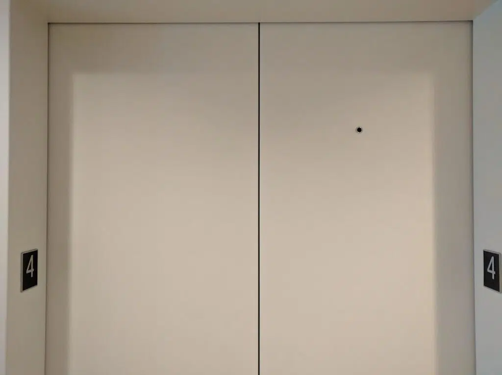 That Tiny Hole On Elevator Doors