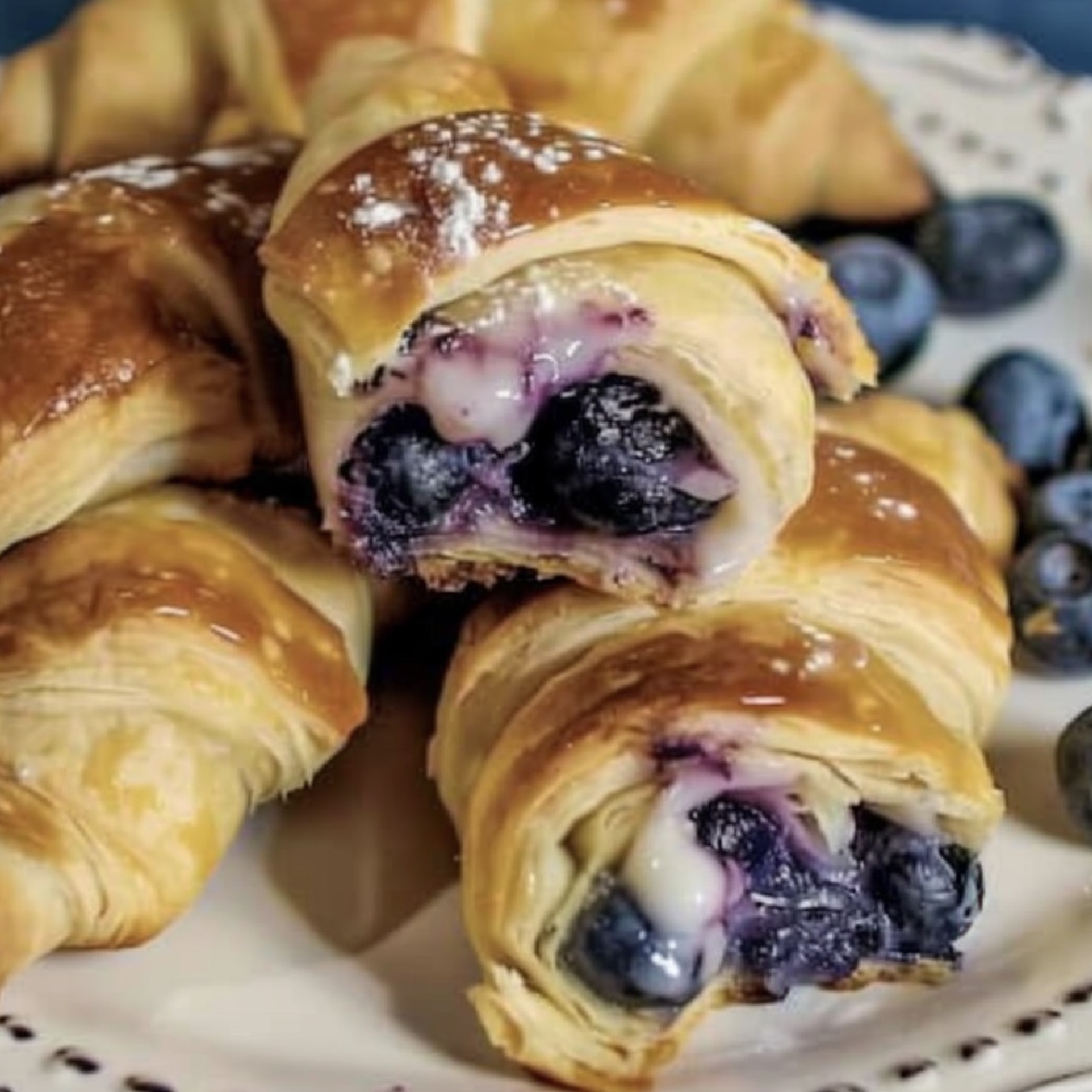 Whip up these delicious Blueberry Cheesecake Rolls in just 25 minutes! Perfect for a last-minute dessert that's sure to impress.