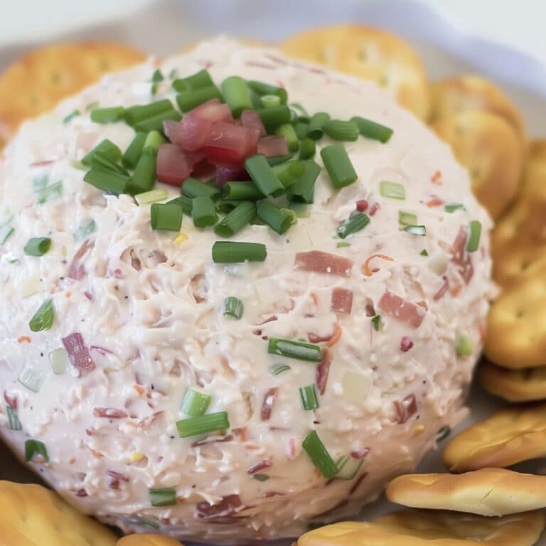 Recreate the magic of family gatherings with this nostalgic and creamy Chipped Beef Cheese Ball recipe!