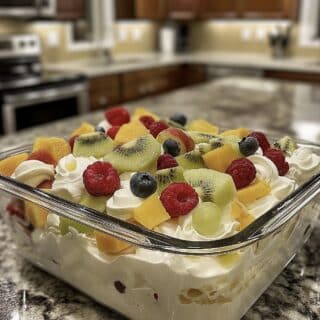 Step back in time with this nostalgic frozen fruit salad recipe, a delightful blend of creamy and fruity flavors!