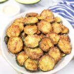 Make this Low-Carb Parmesan Zucchini Recipe for a healthy and tasty snack. It's quick, easy, and perfect for keto diets.