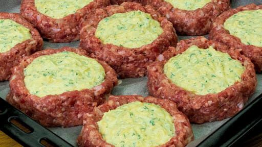 Minced meat nests with cheese filling and herbs