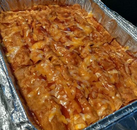 BEEF ENCHILADAS with extra cheese on top!