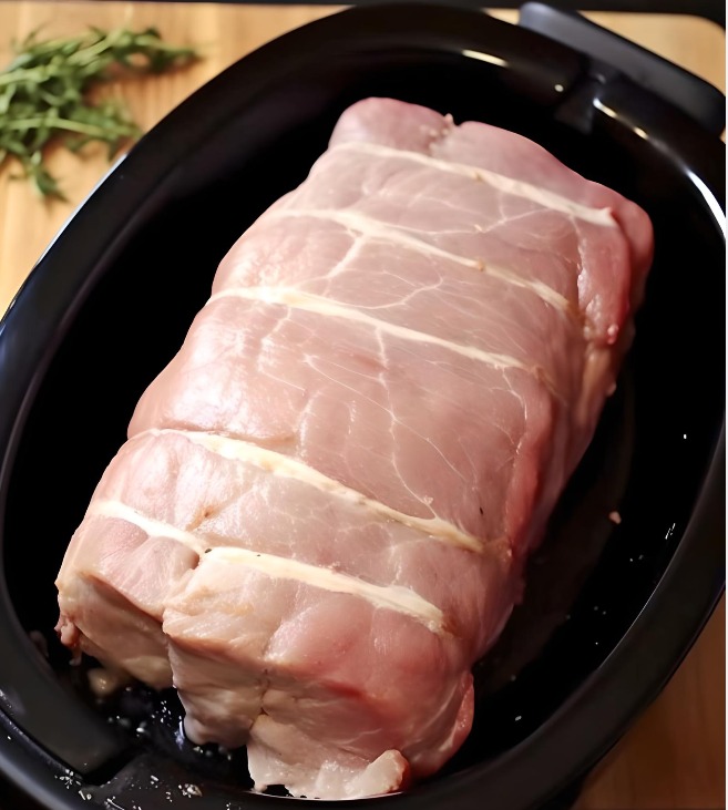 Put pork loin and apples in a slow cooker for this melt-in-your-mouth meal