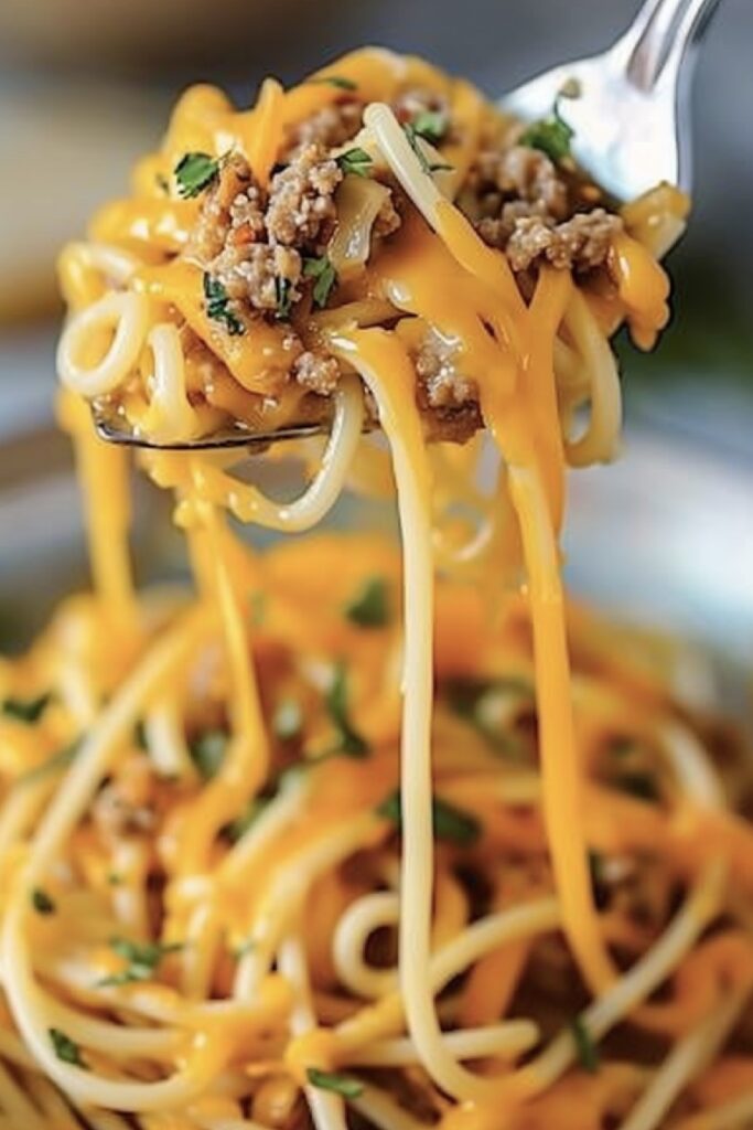 Make dinner time special with this Family Favorite Taco Spaghetti Bake. It's cheesy, flavorful, and perfect for any night of the week.